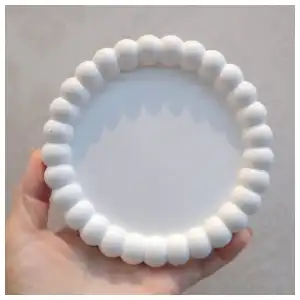 Bandeja redonda con relieve miniatura 1