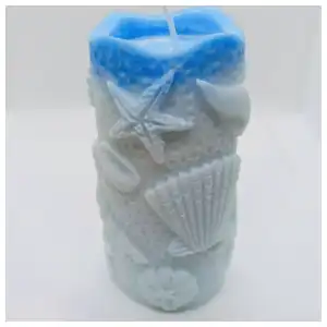 Vela cilíndrica con diseño de mar miniatura 1